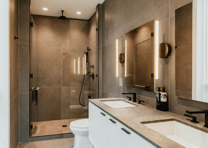 Modern bathroom remodel with large-format tile and double vanity