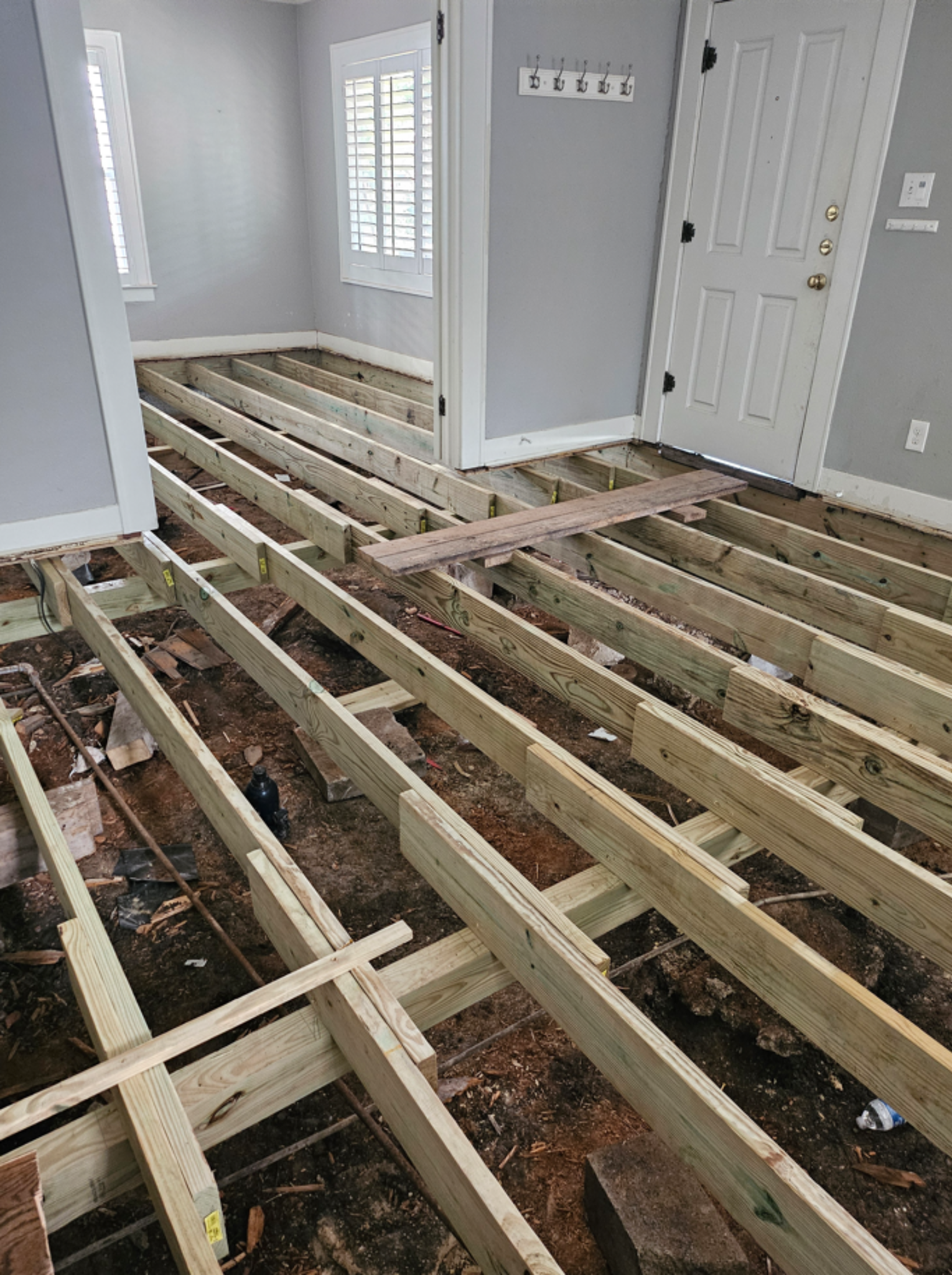 New floor joists installed during foundation repair
